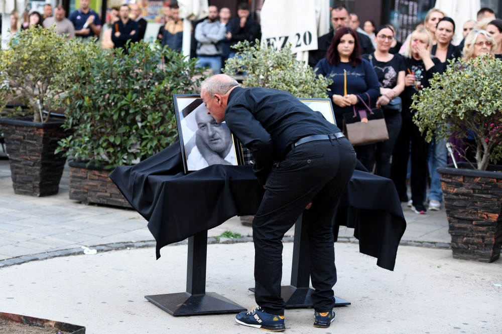 Kosovo Serbs gather in the northern part of Mitrovica on September 26, 2023 to pay their respect and light candles for the gunmen killed in the clashes with Kosovo police near the border with Serbia during the weekend. (Photo by STRINGER / AFP)
