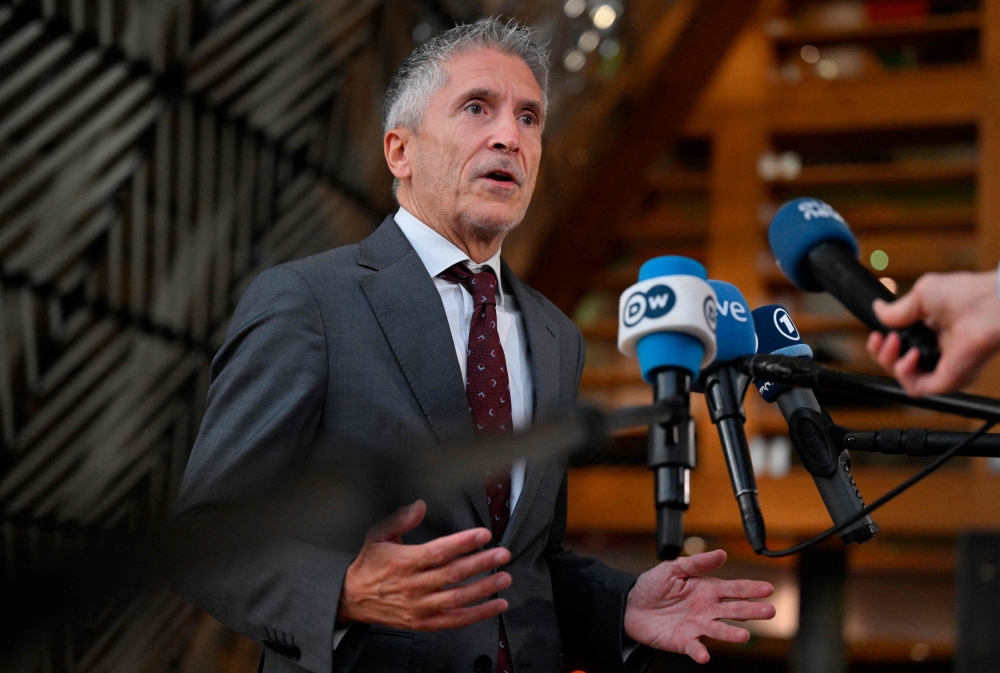 Spain's Interior Minister Fernando Grande-Marlaska answers the journalists during a Justice and Home affairs Council at the EU headquarters in Brussels on September 28, 2023. (Photo by John Thys / AFP)