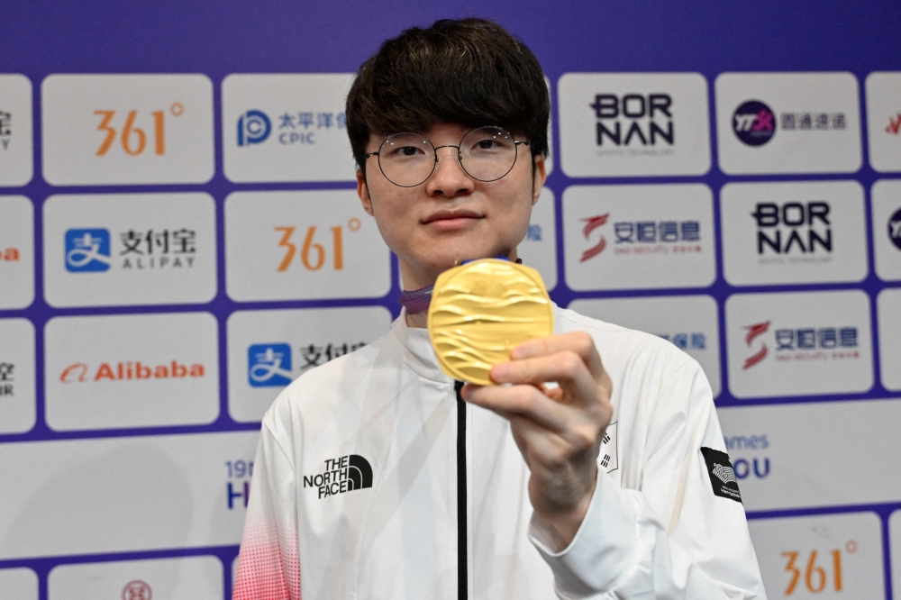 Gold medallist South Korea's Lee Sang-hyeok alias