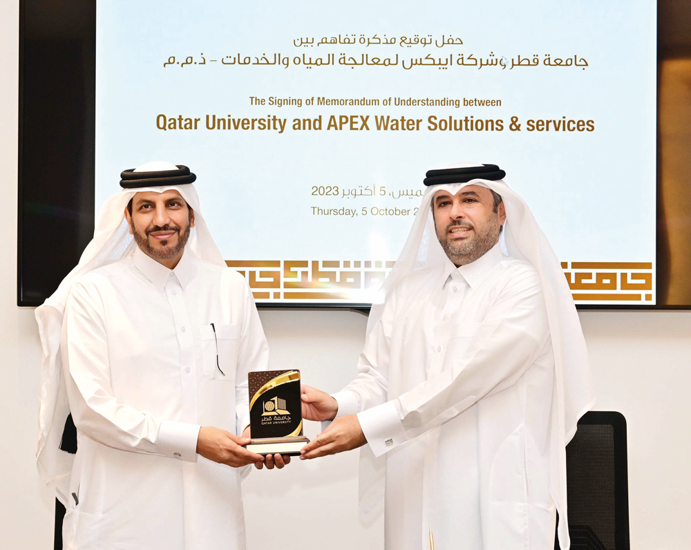 Acting Vice President for Academic Affairs at QU, Dr. Ibrahim Mohamed Al Kaabi, and Chairman of the Board of Directors at Apex Water and Services, Dr. Sheikh Faisal bin Jassem Al Thani during the signing ceremony.