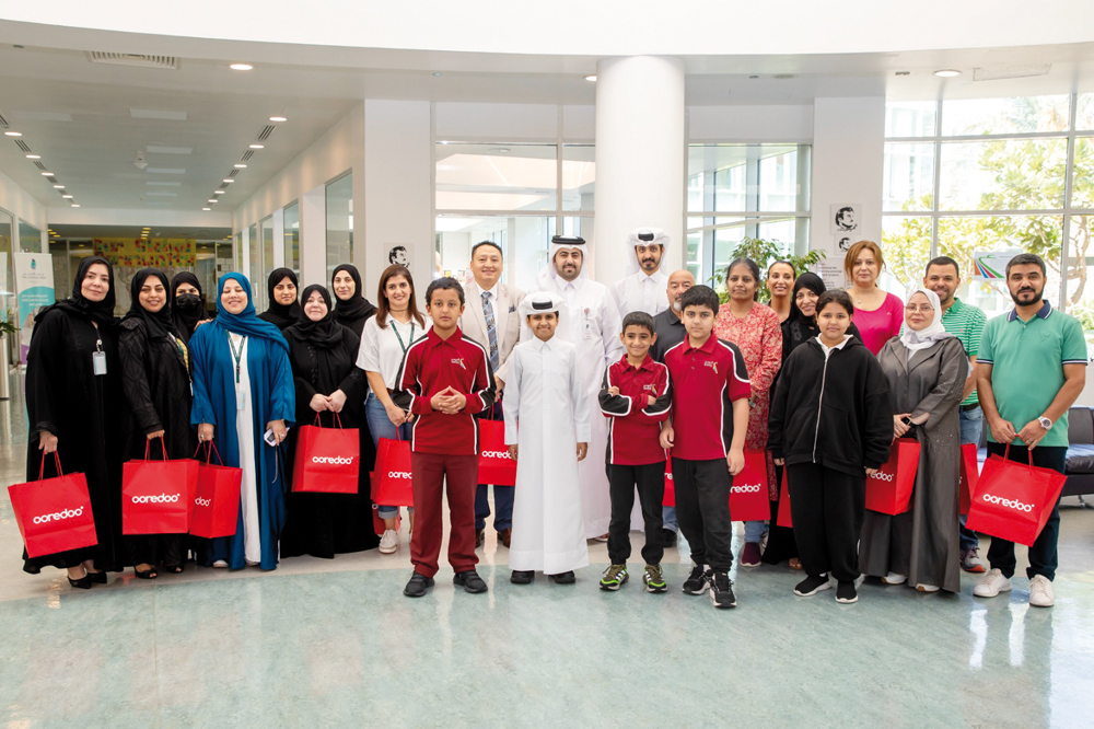 Officials with a group of teachers to mark World Teachers' Day.