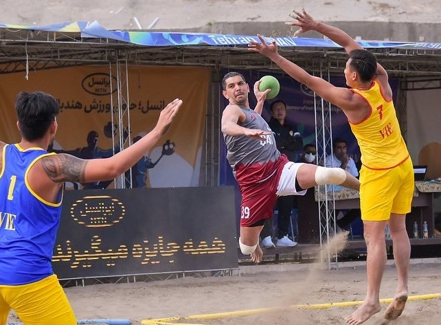 A file photo of beach handball action. 