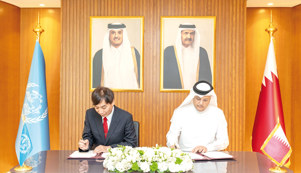 Minister of Communications and Information Technology H E Mohammed bin Ali Al Mannai and Director General of the Universal Postal Union Masahiko Metoki signing an agreement to set up UPU’s regional office in Doha.
