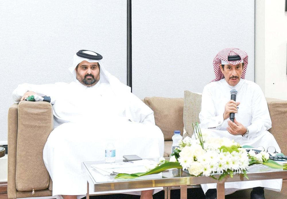 Director of the Media Development Department at Qatar Media Corporation, Sheikh Khalid bin Abdulaziz Al Thani (left) and President of Qatar Press Center, Saad Mohammed Al Rumaihi during a discussion session on Palestine issue yesterday.