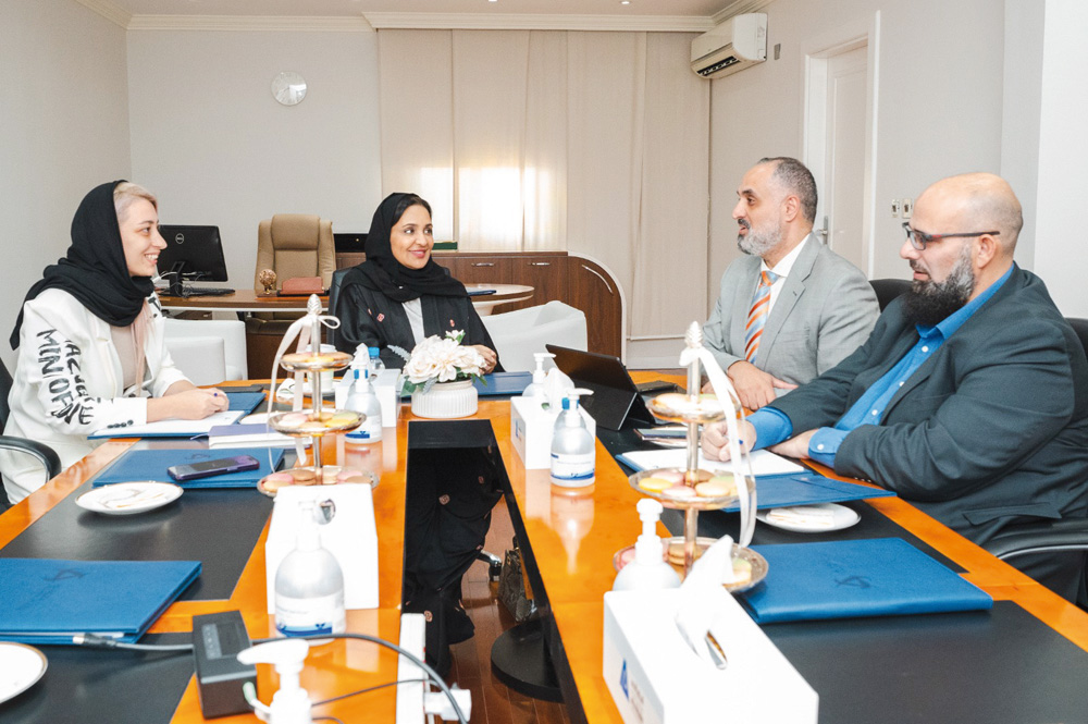 Founder and Chairperson of Al Faleh Educational Holding H E Dr. Sheikha Aisha bint Faleh Al Thani (second left) during a meeting with officials.