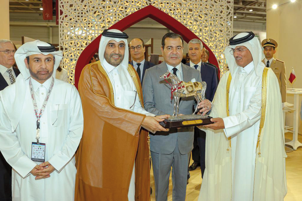 QREC Chairman Issa bin Mohammed Al Mohannadi presents the memento to H R H Prince Moulay Rachid in presence of Ambassador of Qatar to Morocco H E Sheikh Abdullah bin Thamer Al Thani.  