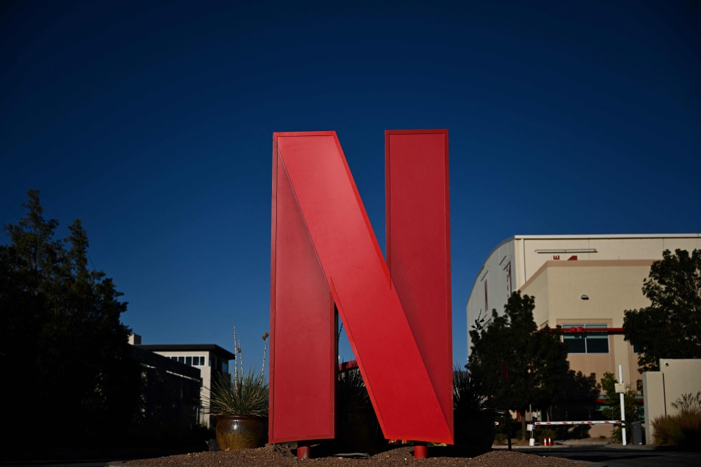 The Netflix logo is displayed at the entrance to Netflix Albuquerque Studios film and television production studio lot in Albuquerque, New Mexico, on October 13, 2023. Photo by Patrick T. Fallon / AFP