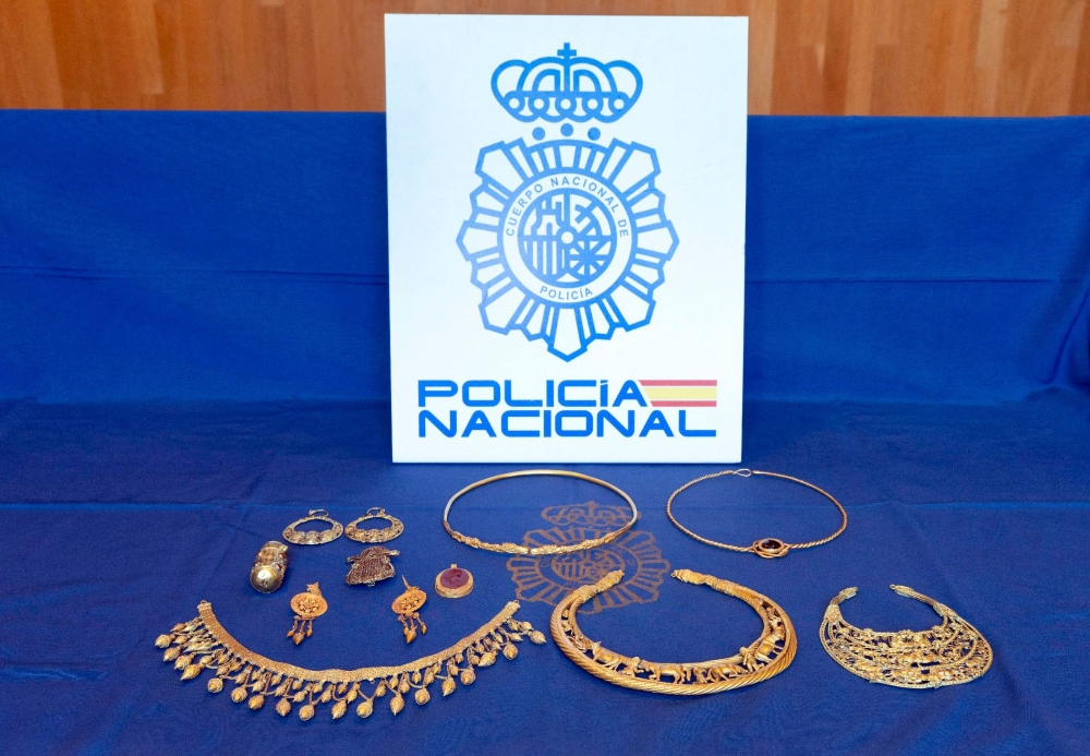 This handout photograph released by Policia Nacional / Spanish National Police on October 23, 2023 shows some of the stolen Ukrainian ancient gold jewellery seized by Spanish police. (Photo by Handout / Spanish National Police / AFP)