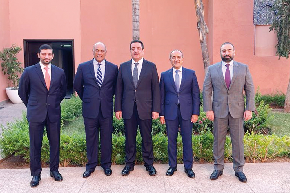 Officials pose for a group photo during the meeting in Marrakesh.