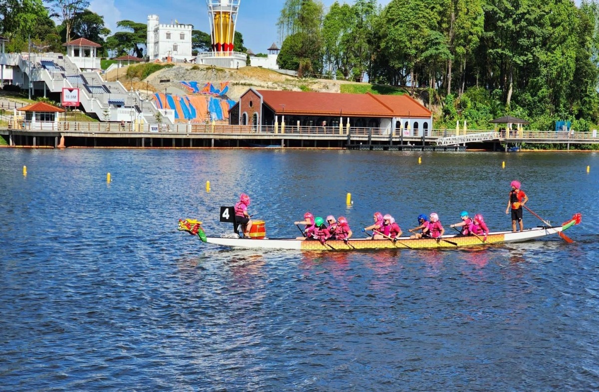 The Doha Wireless Warriors during the cancer survivors race event at the 2023 Sarawak International Dragon Boat Regatta in Malaysia.