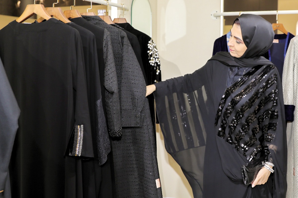 Qatar Chamber board member and Chairperson of the Qatari Businesswomen Forum, Ibtihaj Al Ahmadani during tour of the exhibition. 