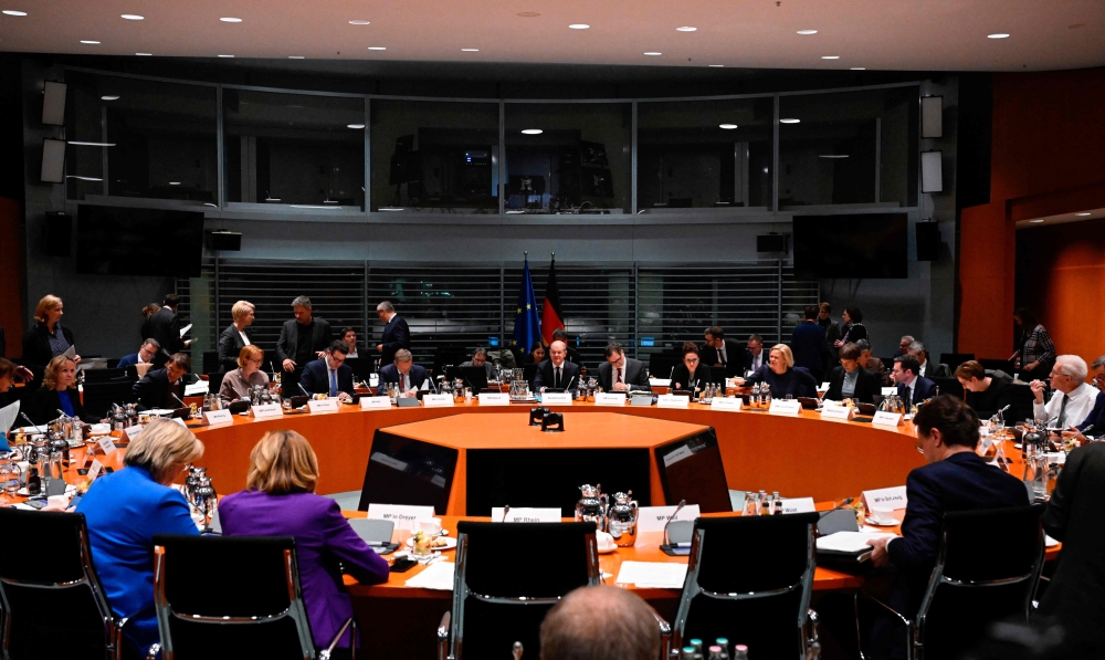 German Chancellor Olaf Scholz (back C) attends a conference with Germany's state premiers and ministers (MPK) at the Chancellery in Berlin on November 6, 2023. (Photo by Tobias SCHWARZ / AFP)
