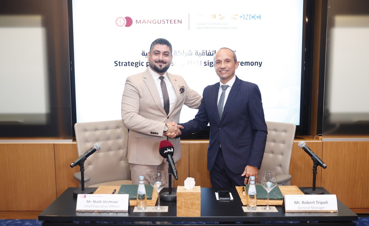 QNCC GM Robert Tripoli (right) with CEO of Mangusteen Malik Shishtawi during the agreement signing ceremony.