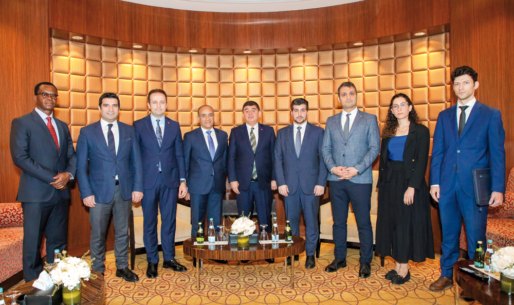 Turkish Ambassador in Qatar H E Dr M Mustafa Goksu; Commercial Bank Group Chief Executive Officer Joseph Abraham with other officials during the event.