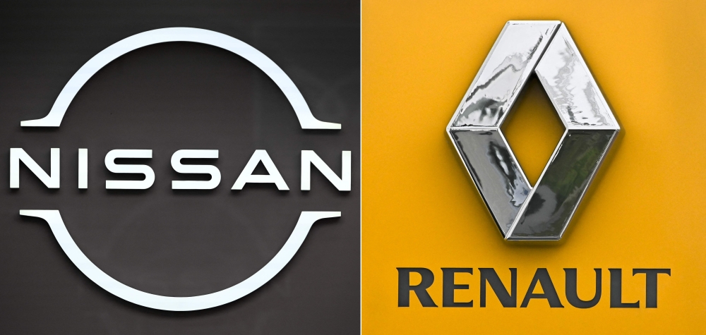 This combination of pictures made on January 17, 2023 shows the logos of French automaker Renault and its Japanese partner Nissan displayed in a showroom in Tokyo. Photo by Kazuhiro NOGI / AFP