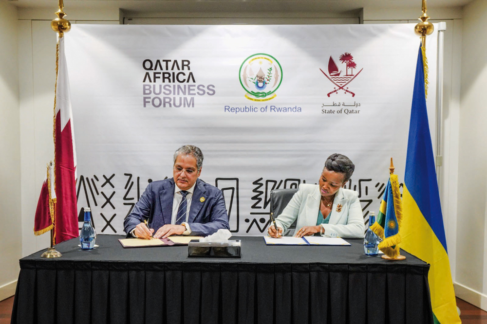 Minister of Communications and Information Technology H E Mohammed bin Ali Al Mannai (left) and Rwanda's Minister of Information Technology, Communications, and Innovation H E Paula Ingabire signing the MoU.