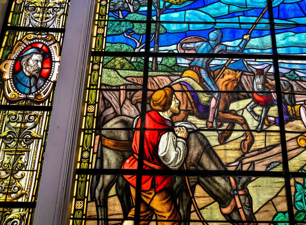 Details of a restored stained-glass window with scenes of Don Quixote, on November 7, 2023, in Havana. (Photo by Adalberto Roque / AFP)