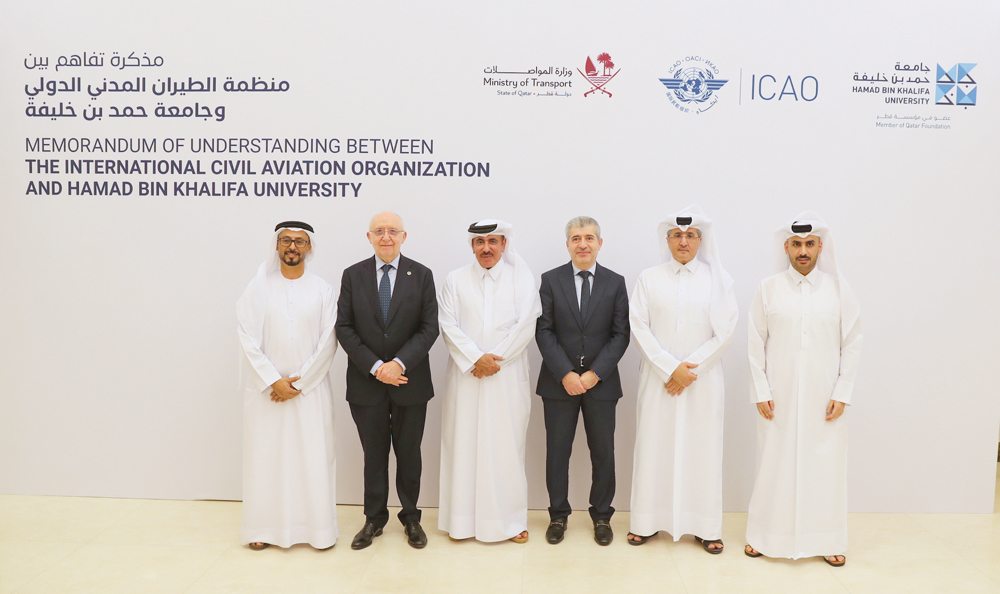 Minister of Transport H E Jassim Saif Ahmed Al Sulaiti (third left); HBKU President Dr. Ahmed M. Hasnah (fourth left); President of the ICAO Council Salvatore Sciacchitano (second left) and other officials at the MoU signing ceremony.