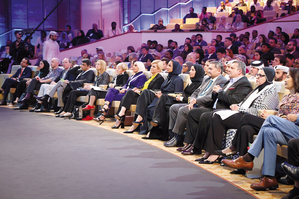 Minister of Education and Higher Education H E Buthaina bint Ali Al Jabr Al Nuaimi (fifth right) and Vice Chairperson and CEO of Qatar Foundation H E Sheikha Hind bint Hamad Al Thani (sixth right)with other officials and dignitaries during the closing session of WISE 11 yesterday.  