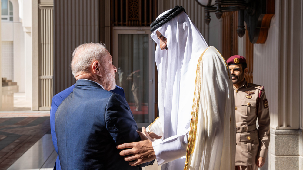 Amir H H Sheikh Tamim bin Hamad Al Thani receiving President of Brazil H E Luiz Inacio Lula da Silva.
