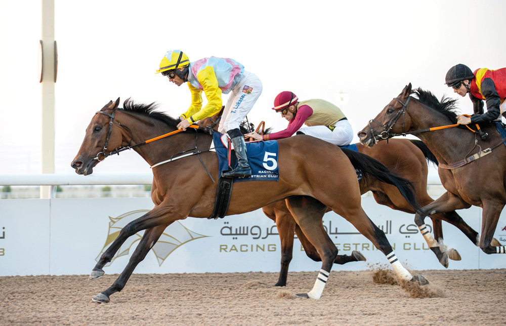 Jockey Tomas Lukasek guides Al Rabban Racing’s Harb towards the finish line to win the Ras Al Noof Cup, yesterday. Pic: Juhaim/QREC