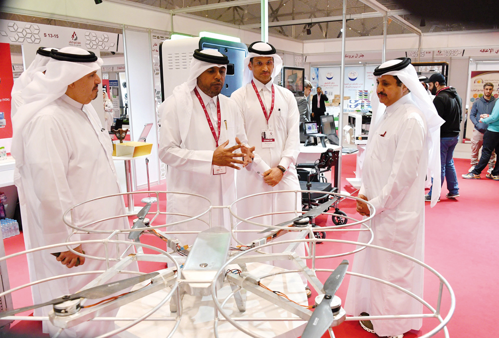 Chairman of Qatar Chamber Sheikh Khalifa bin Jassim Al Thani with other officials during the exhibition tour.