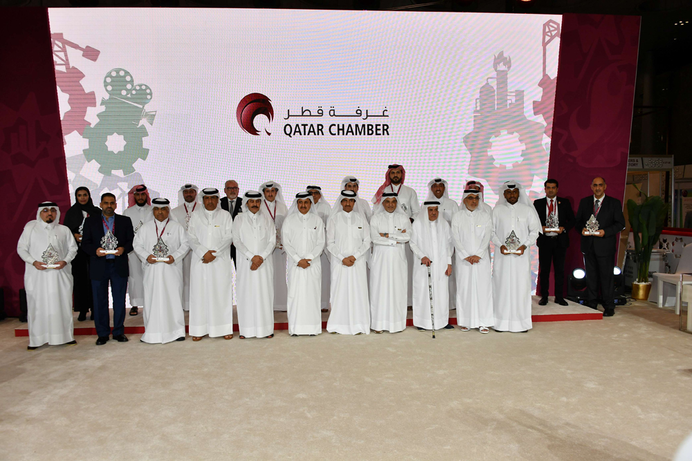 Qatar Chamber officials with sponsors during the honouring ceremony.