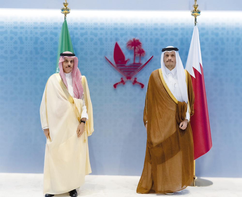 Prime Minister and Minister of Foreign Affairs H E Sheikh Mohammed bin Abdulrahman bin Jassim Al Thani with  Minister of Foreign Affairs of the Kingdom of Saudi Arabia H H Prince Faisal bin Farhan bin Abdullah Al Saud in Doha yesterday.