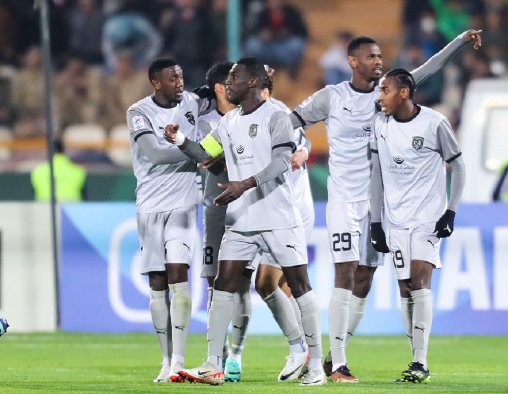 Al Duhail players celebrate their win in Tehran yesterday. 