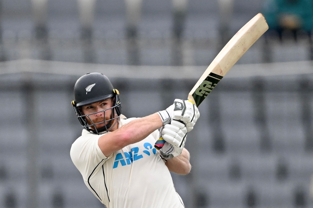 New Zealand's Glenn Phillips plays a shot during the third day of the second Test cricket match between Bangladesh and New Zealand at the Sher-E-Bangla National Cricket Stadium in Dhaka on December 8, 2023. Photo by Munir UZ ZAMAN / AFP