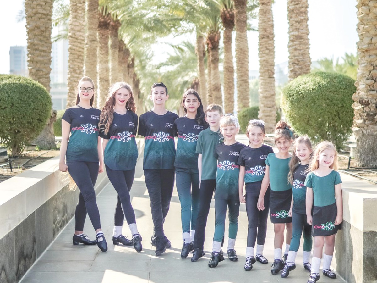 The students in a group photo at the event in Dubai.