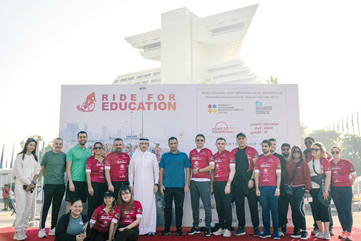 Officials pose for a photograph after the ‘Ride for Education 2023’ cycling event at the Sheraton Grand Doha Resort & Convention Hotel.