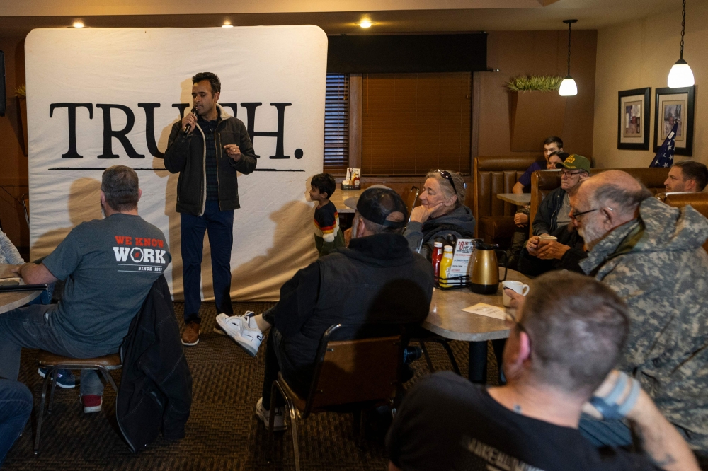 Entrepreneur and 2024 Presidential hopeful Vivek Ramaswamy speaks at a local restaurant during a visit in Cherokee, Iowa, on December 9, 2023, ahead of the Iowa caucus. (Photo by Christian MONTERROSA / AFP)
