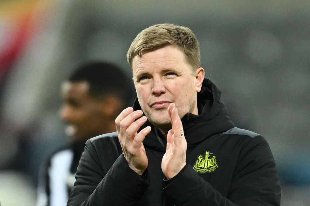 Newcastle United's English head coach Eddie Howe applauds at the end of the UEFA Champions League Group F football match between Newcastle United and AC Milan at St James' Park in Newcastle-upon-Tyne, north east England on December 13, 2023. (Photo by Paul ELLIS / AFP)
