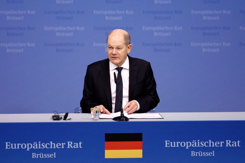Germany's Chancellor Olaf Scholz speaks during a press conference at the end of the European Council at the European headquarters in Brussels, on December 15, 2023. (Photo by Kenzo Tribouillard / AFP)