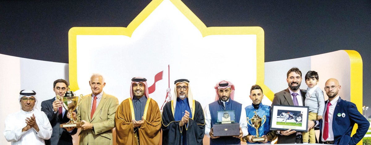 Minister of Sports and Youth H E Salah bin Ghanim Al Ali (fifth left) presented The Late Sheikh Jassim Bin Mohammed Trophy to the connection of Bakir. Pics: Juhaim/QREC