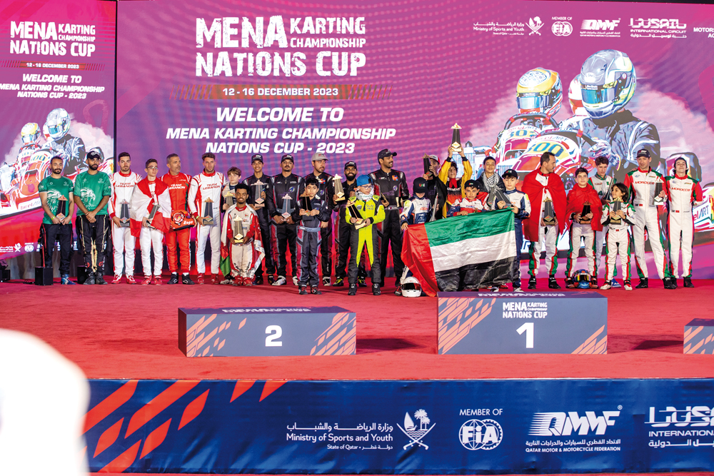 The podium winners celebrate with their trophies at the closing ceremony of the MENA Karting Championship Nations Cup at the Lusail International Circuit’s (LIC) karting track yesterday.