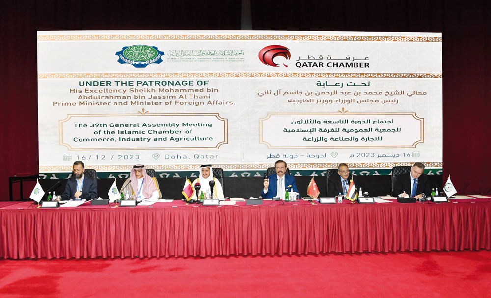 President of ICCIA Abdullah Saleh Kamel, QC Chairman and First Vice-President of the ICCIA Sheikh Khalifa bin Jassim Al Thani with officials during the 39th General Assembly Meeting held at Sheraton Doha, yesterday.