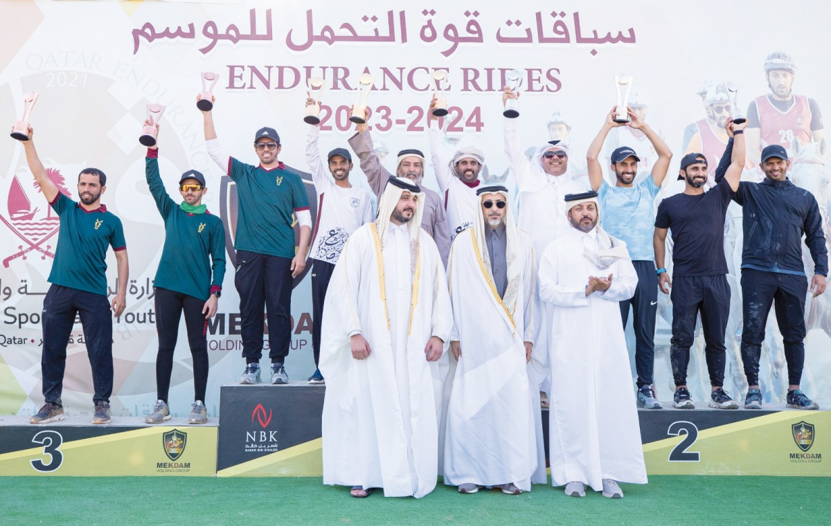 Minister of Sports and Youth H E Salah bin Ghanem Al Ali and other officials with the winners.