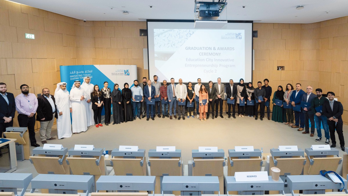 Recipients and HBKU officials at Education City Innovative Entrepreneurship Program (ECIEP) graduation and awards ceremony. 
