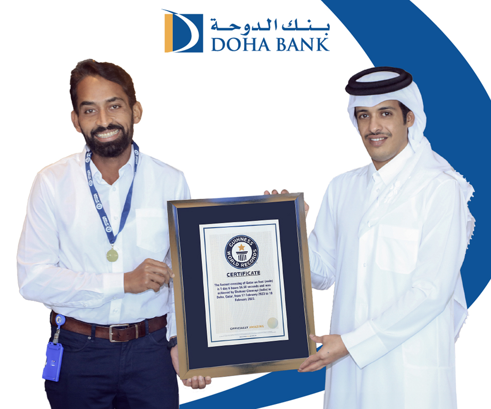 Doha Bank Group CEO Sheikh Abdulrahman bin Fahad bin Faisal Al Thani (right) and Shakeer Cheerayi with the award.