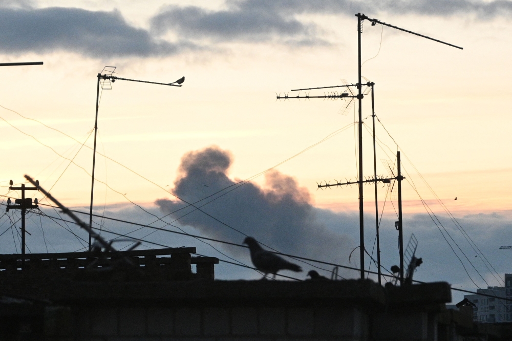 Smoke rises following missile strikes in Lviv, western Ukraine, on December 29, 2023, amid the Russian invasion of Ukraine. (Photo by Yuriy Dyachyshyn / AFP)