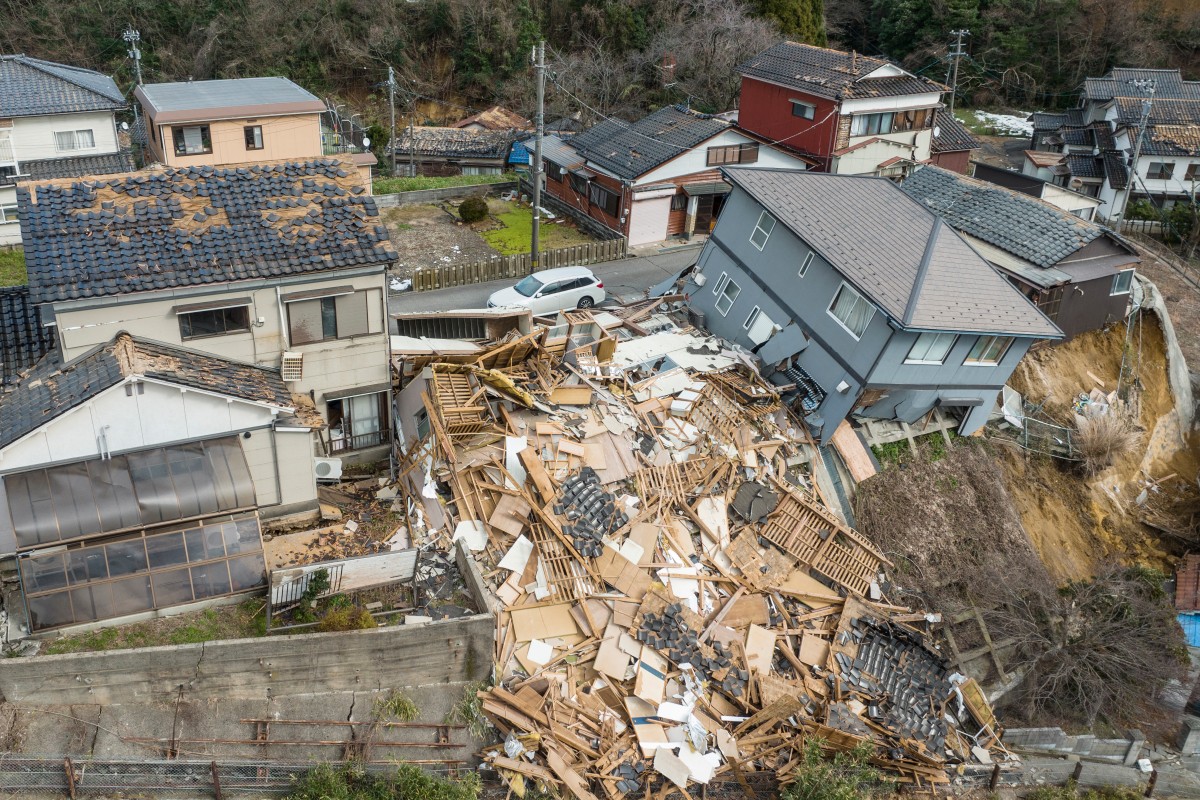This aerial photo shows damaged and destroyed homes along a street in Wajima, Ishikawa prefecture on January 2, 2024, a day after a major 7.5 magnitude earthquake struck the Noto region in Ishikawa prefecture. Photo by Fred MERY / AFP