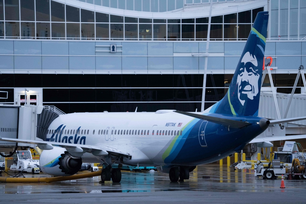 An Alaska Airlines Boeing 737 MAX 9 plane sits at a gate at Seattle-Tacoma International Airport on January 6, 2024 in Seattle, Washington. Stephen Brashear/Getty Images/AFP 