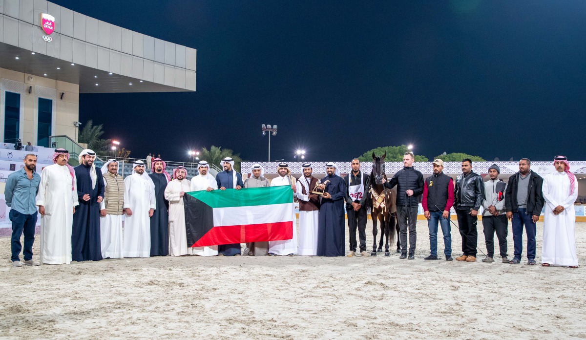 The team members of Bashir Al Bashir after the horse won gold in the Senior Stallions Championship at the 3rd Doha International Arabian Horse Show at Qatar Equestrian Federation’s outdoor arena. 