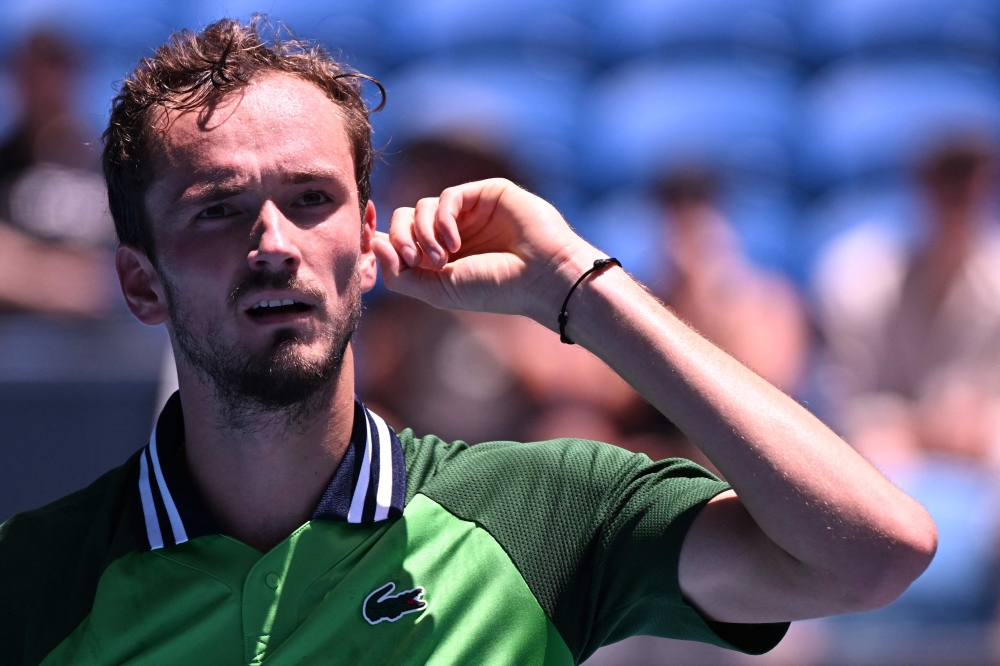 Russia's Daniil Medvedev reacts after a point against France's Terence Atmane during their men's singles match on day two of the Australian Open tennis tournament in Melbourne on January 15, 2024. (Photo by WILLIAM WEST / AFP) 