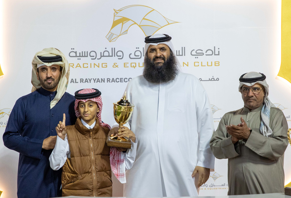 Ambassador of the State of Qatar to Bosnia and Herzegovina H E Meshaal bin Ali Al Attiyah (third left) with the connections of Toromona after the Awajan K A Al Khayarin-owned horse won the Khor Al Adaid Cup at QREC's 23rd Al Rayyan Meeting.