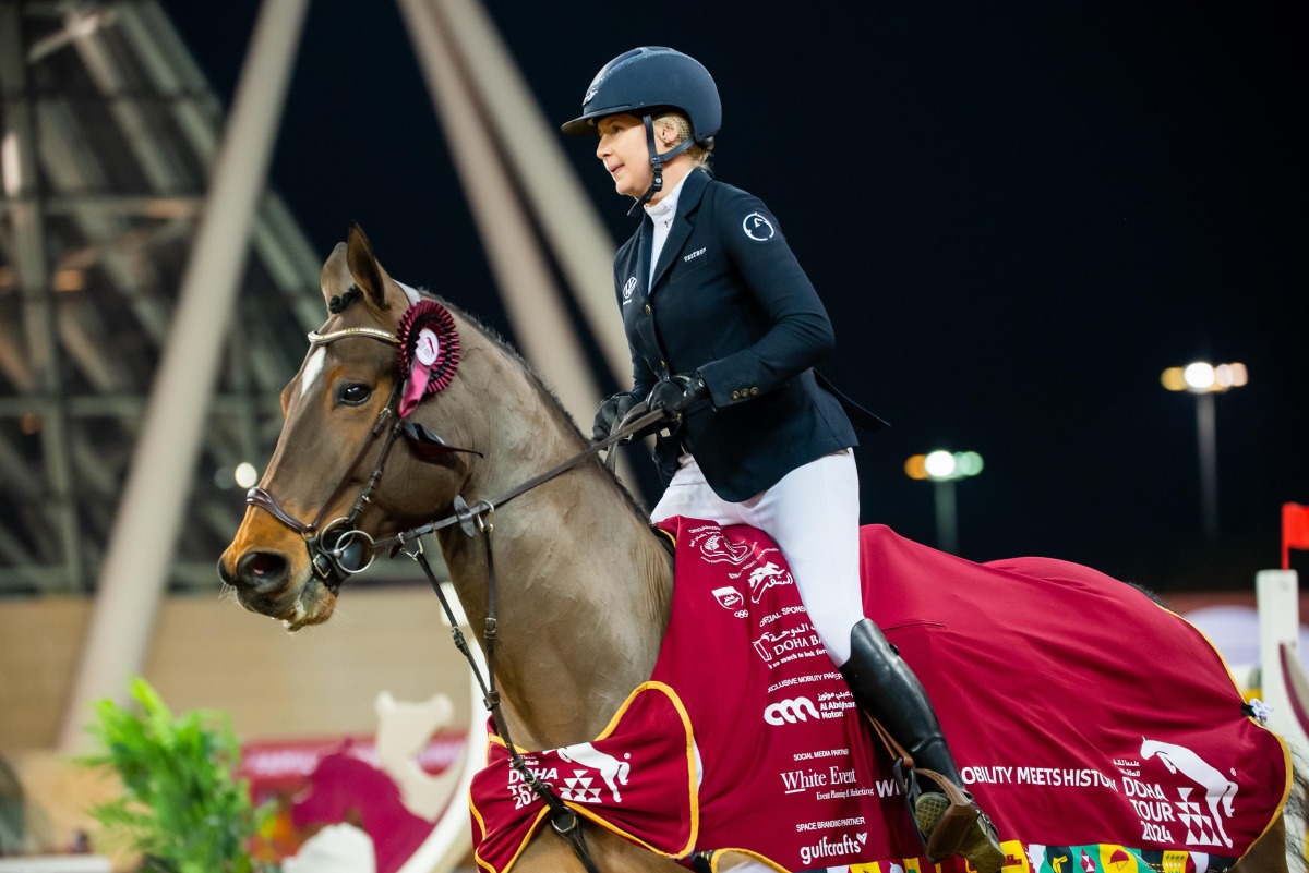 Sweden’s Evelina Tovek celebrates after winning the CSI4* 1.50m event.