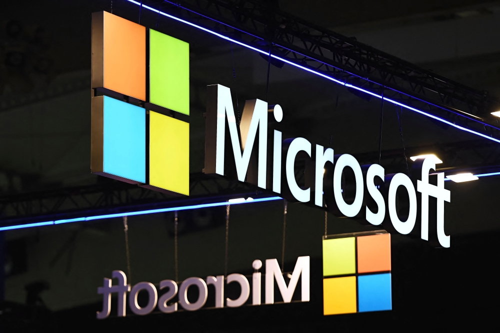 File: The logo of Microsoft US multinational technology corporation is seen on the opening day of the Integrated Systems Europe (ISE) audiovisual and systems integration exhibition in Barcelona on January 31, 2023. (Photo by Pau Barrena / AFP)