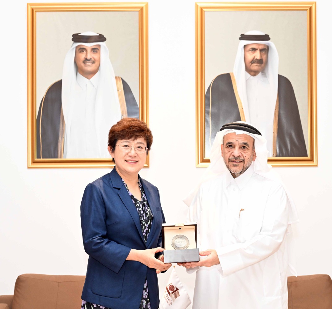 QU President Dr. Omar Al-Ansari with Prof. Jie Qiao, Executive Vice President of Peking University and President of Peking University Health Science Centre 